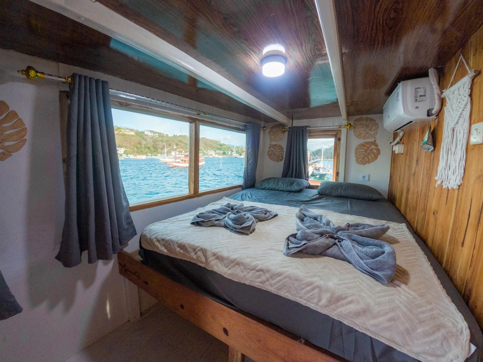 Almadira — CABIN 4-5 - Deluxe Ocean Upper Deck (queen Bed + Bathroom) (image 1)